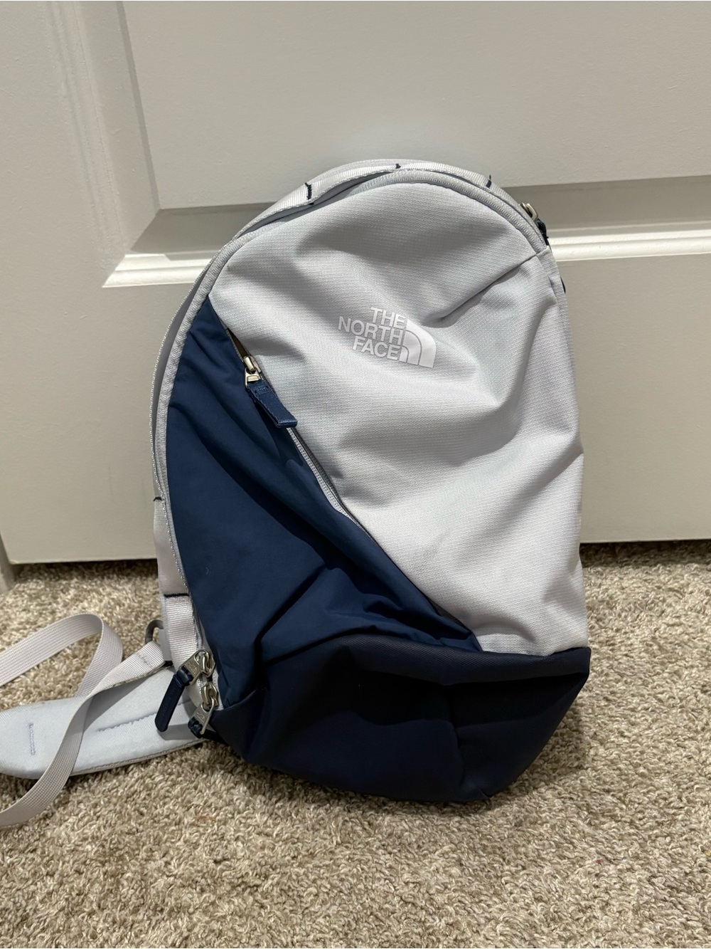 The North Face White and Navy Sling Backpack